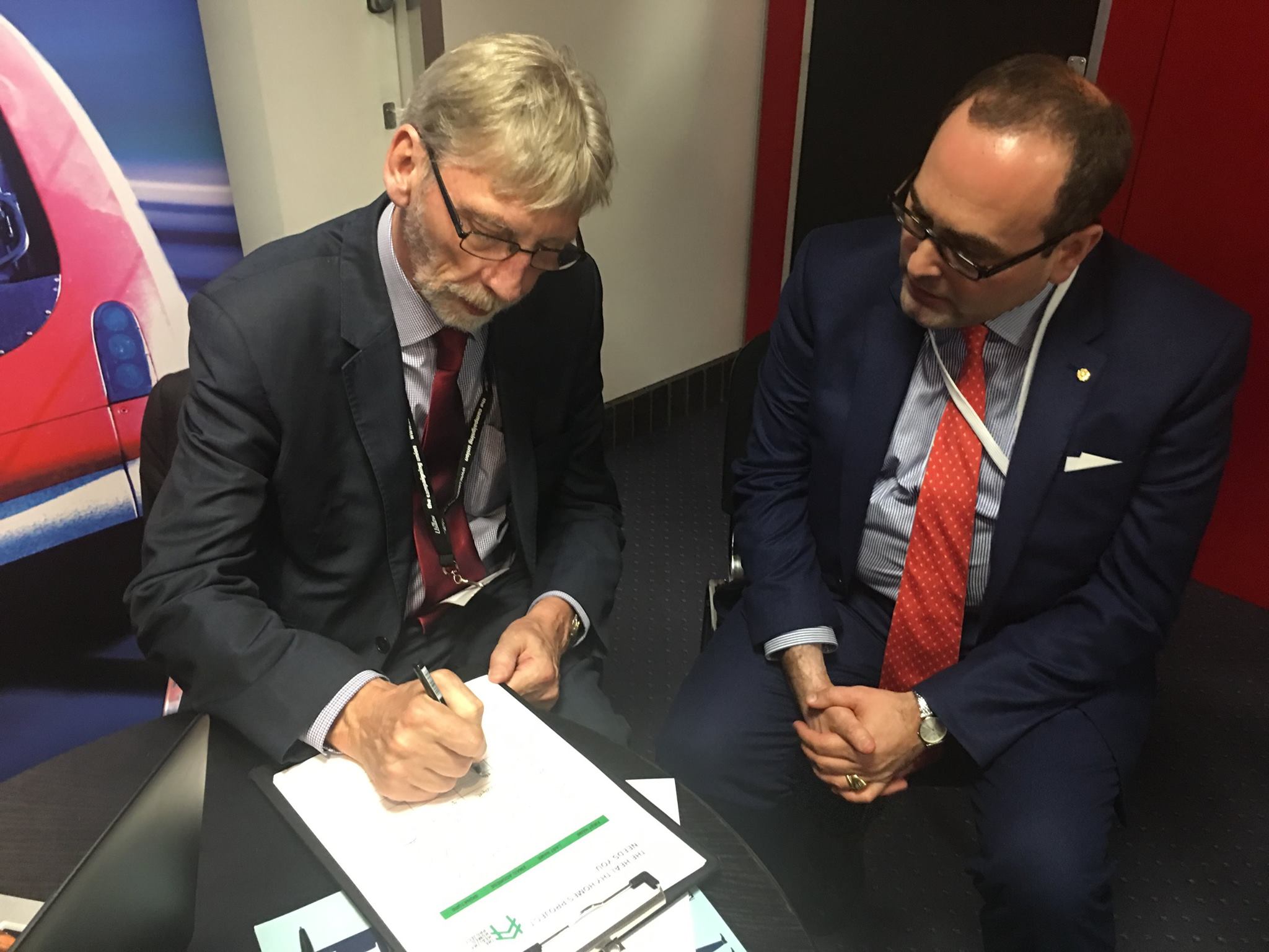 Maurizio Bragagni and George-Howarth Labour MP signing the petition